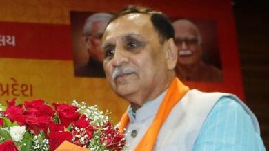 Vijay Rupani's family during the funeral procession following the Air India crash tragedy