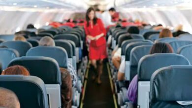 Fear of flying after plane crash – passenger with anxiety in airplane cabin