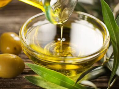 Olive oil brain health benefits shown in a bottle of extra virgin olive oil on a kitchen counter