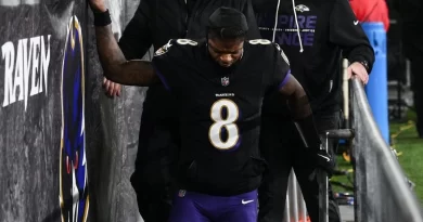 Lamar Jackson Back Injury Forces Early Exit as Ravens Fall to Patriots